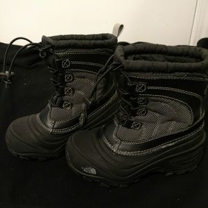 Black The North Face boots, kids 12